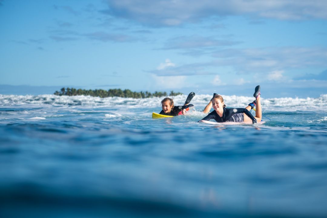 Surfing, one of the best things to do in Fiji with kids